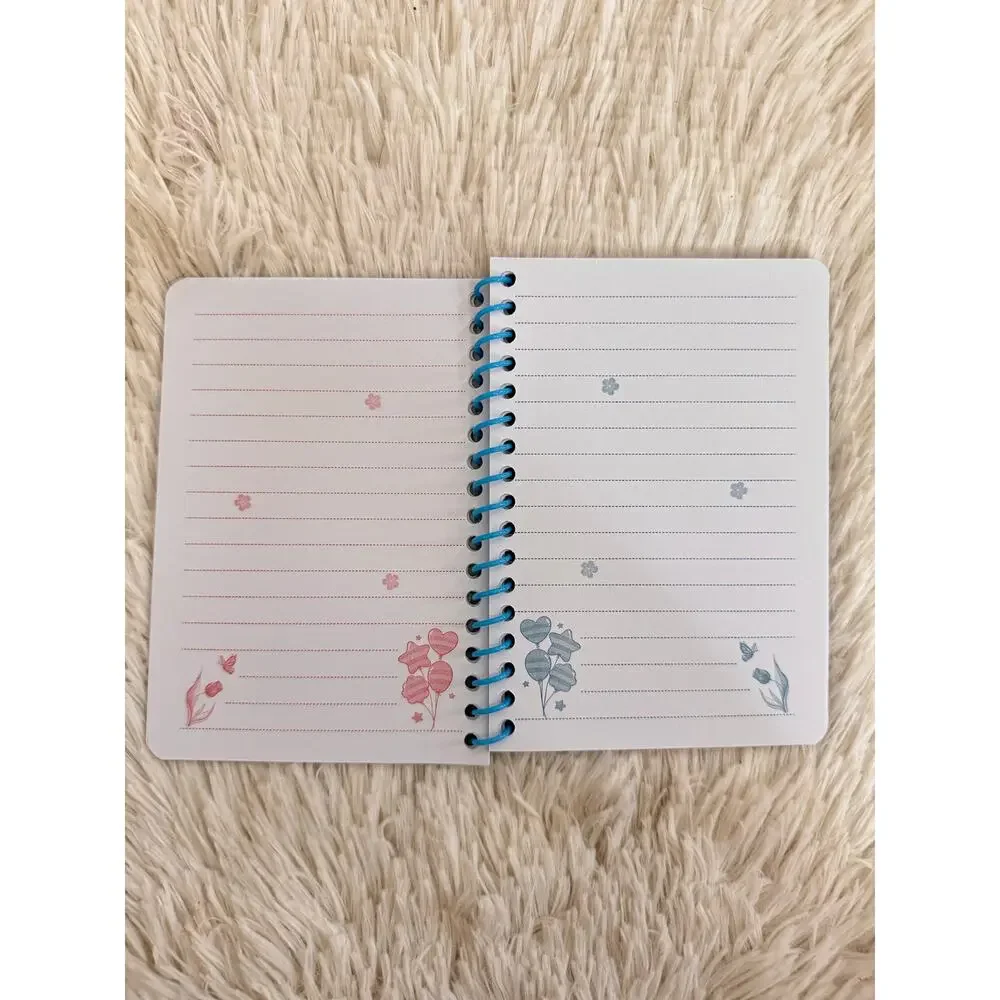 Snoopy blue spiral notebook with designs and a pen size A6